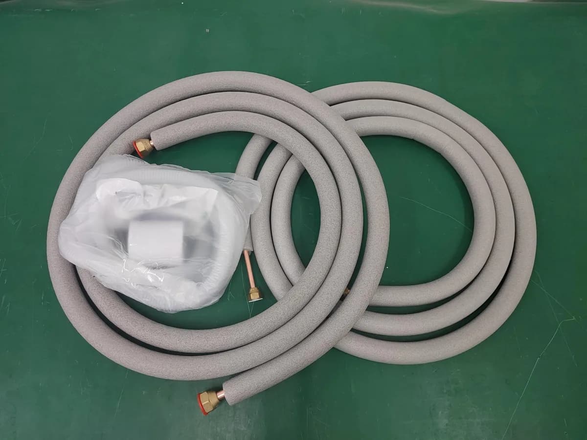 Insulated pipe assemblies and a bagged hose accessory on an inspection work surface