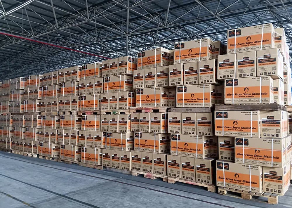 Supplied AMAZ air-conditioner cartons staged on pallets in a warehouse